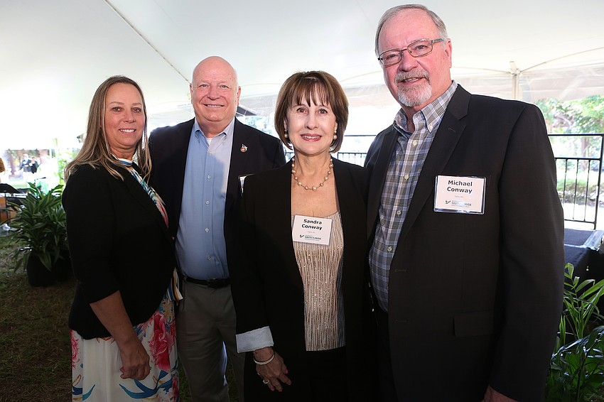 Joni and Rick Will with Sandra and Michael Conway