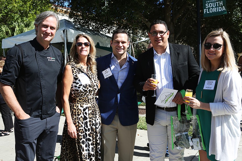 Greg Campbell, chairwoman Elizabeth Moore, mayor Erik Arroyo, Eddie Arroyo and Victoria Arroyo