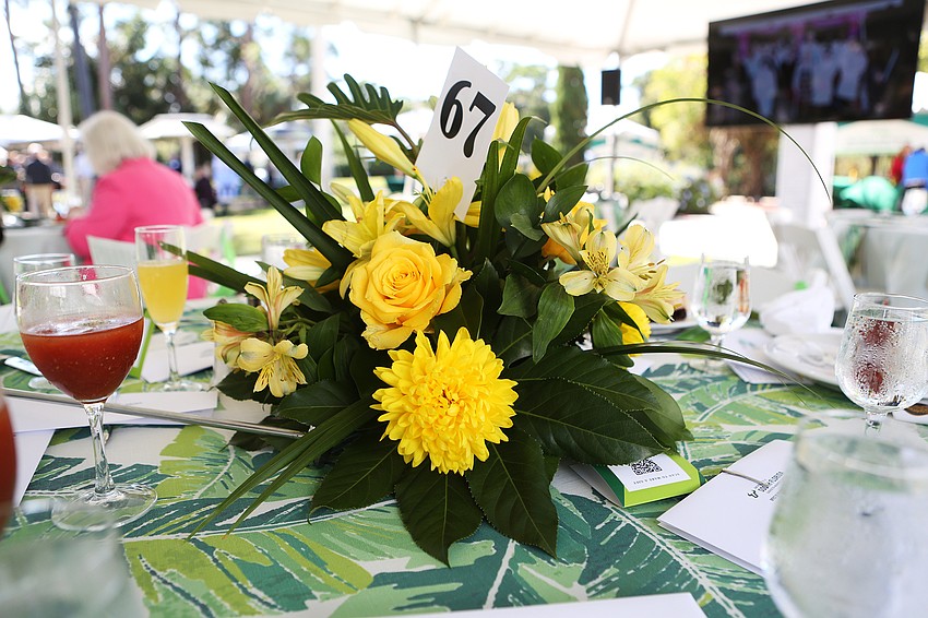 Guests had flowers decorating their tables.