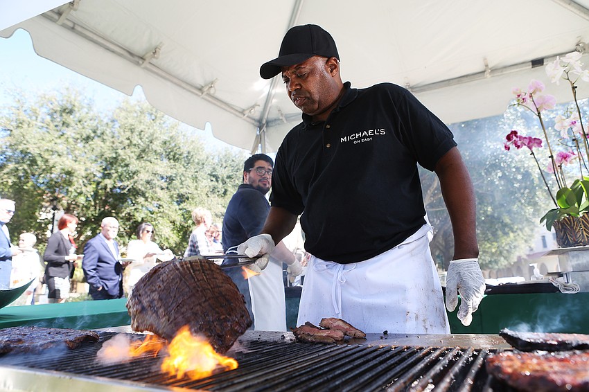 Lavardo Morley cooks steak.
