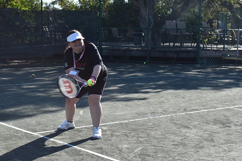 Bryanna Schmidt swings for a ball.