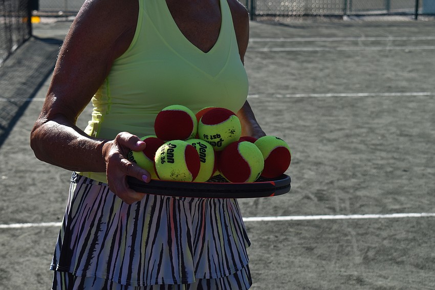 Susie Singer brings more balls.