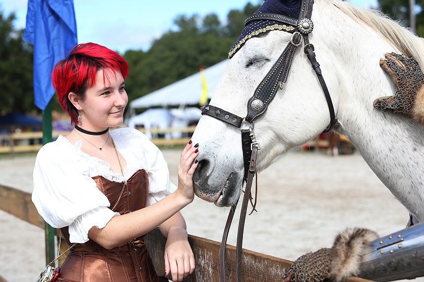 Rose Chawkins pets a steed.