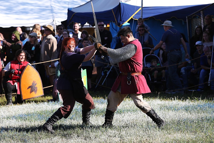 Human Combat Chess  fighters really go for it at Sarasota Medieval Fair.