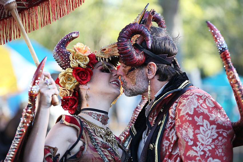 Andrea Meythaler and Joe Monach were a disproportionately hot couple dressed as dragon lords Queen Volastra and King Deusignus at Sarasota Medieval Fair.