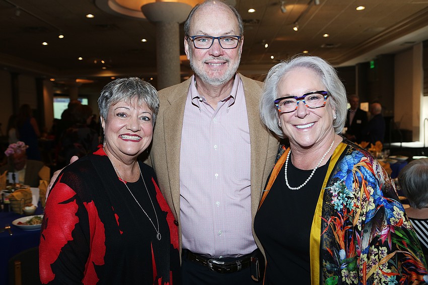 Chapter president Janet Ginn with Tom and Sherry Koski