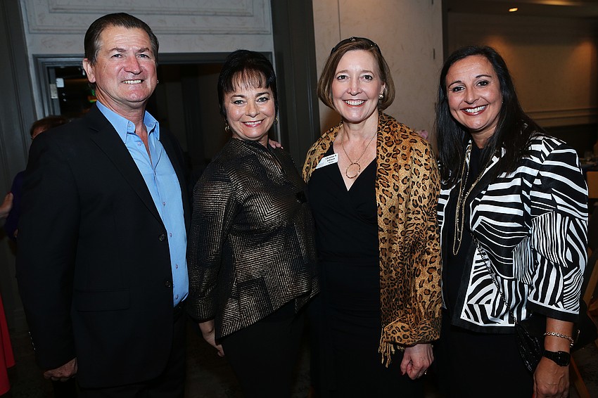 Pedro Reis and Dolly Jacobs-Reis with Christine Johnson and Jennifer Mitchell