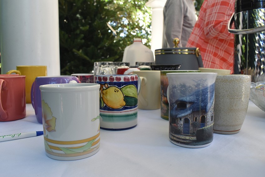 Mugs donated to the Lord's Warehouse served as the coffee cups.
