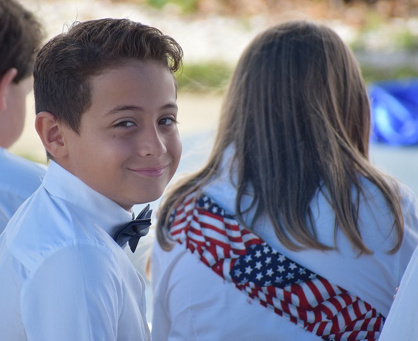 East County's Emmanuel Cortes-Alban, a fourth grader at Rowlett Academy, waits his turn to perform at a special show to honor veterans.