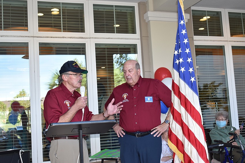 Knights of Columbus member John Joly and Deacon Tom Harenchar lead the invocation at the November 10 Veterans Day ceremony at The Sheridan in Lakewood Ranch.