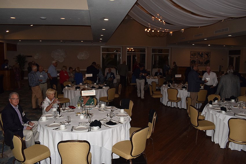 About 70 members of the club gathered for dinner.