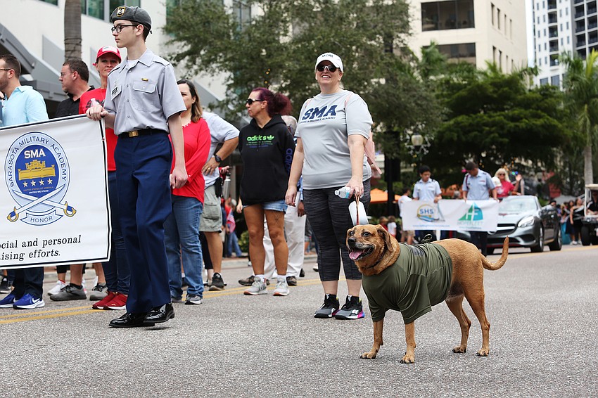 Jeanine Signorelli brings her dog Maxie to the fun.