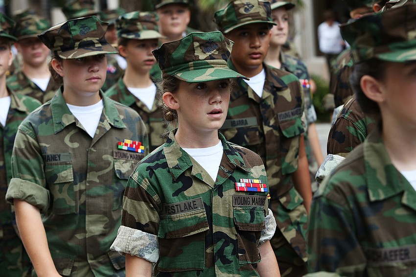 Young Marines from Venice Middle School  march along.