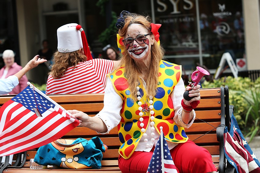 Wilma Thornton waves her flag.