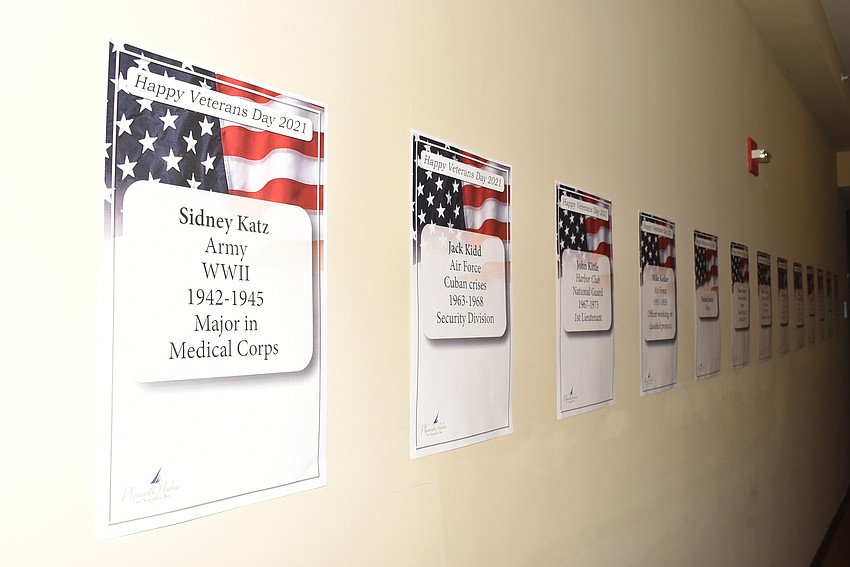 The name of each Plymouth Harbor veteran was posted along the hallway.