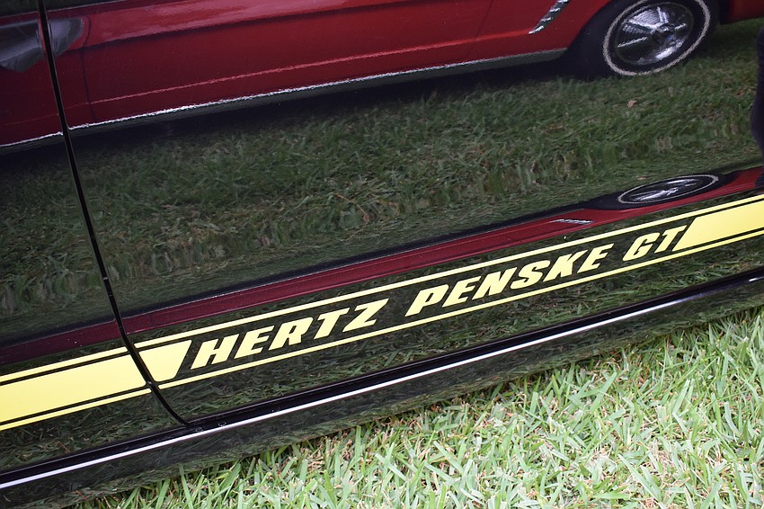 The doors of Norma Fender's 2014 Hertz Penske GT are like mirrors.