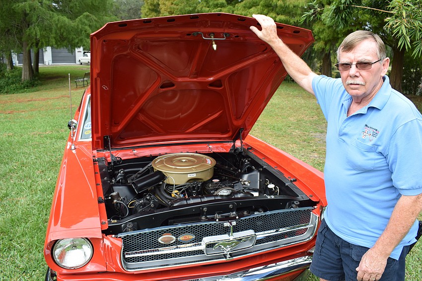Ray Baker of Sarasota shows off the 289 engine.