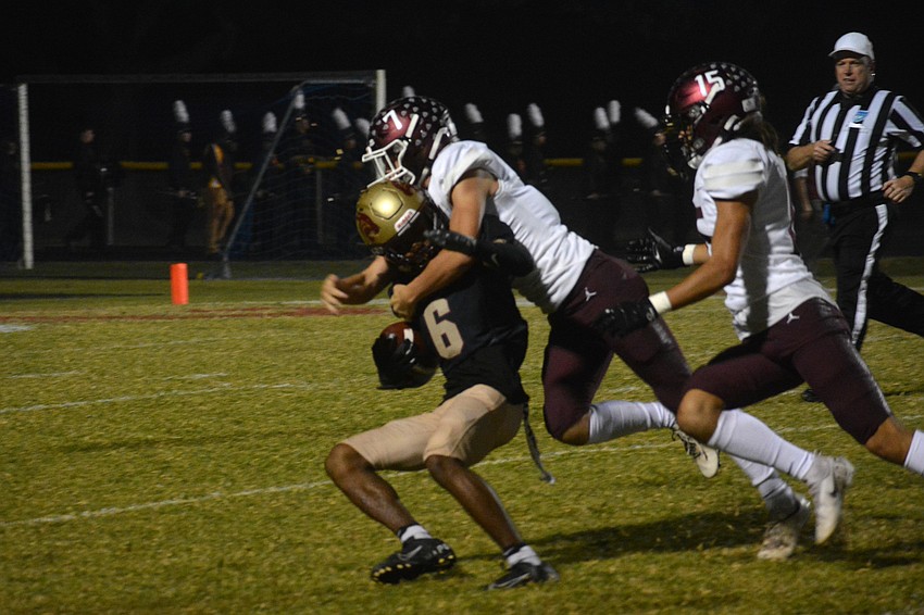 Pirates senior Aaron Tijerina tackles Countryside senior Landis Randleman.