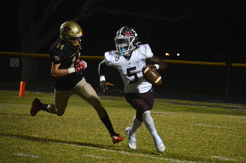 Bryan Kearse escapes pressure from Countryside senior Dylan Cassidy.