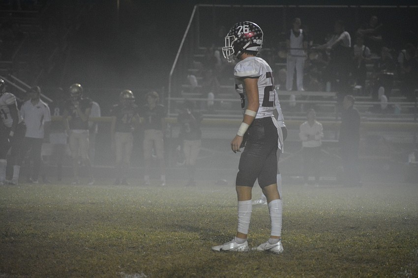 Pirates senior Andrew Nordland reads the Countryside offense as a thick fog descends on the stadium.