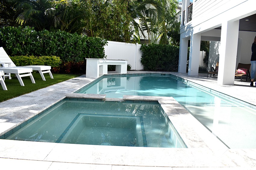 The home features a pool with a spa.