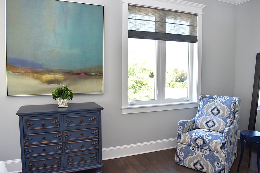 The home offers four bedrooms and four full baths, along with a half bath.