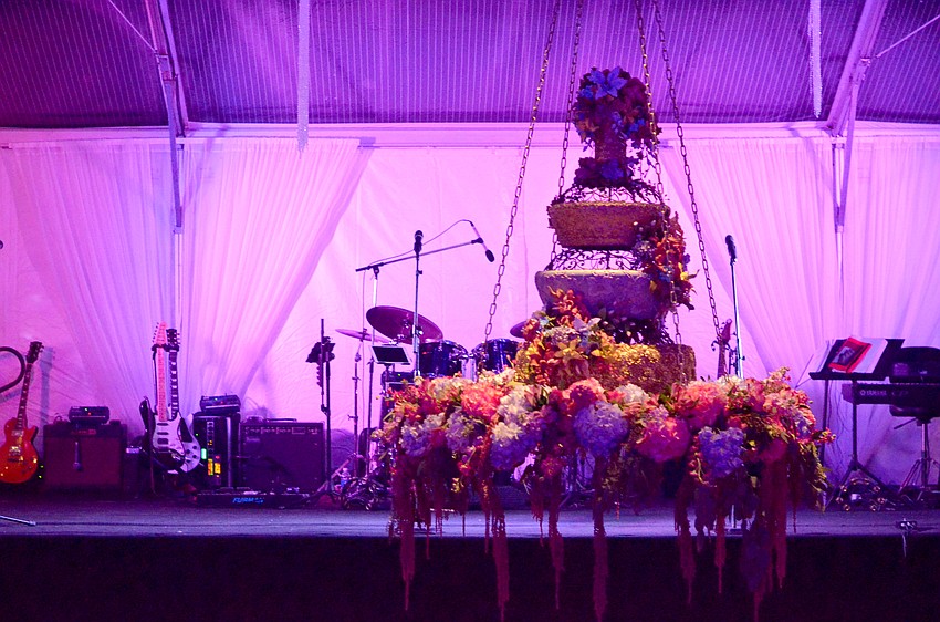 A cake was dropped from the ceiling of the tent at Orchid Ball, as part of a celebration for the 40th anniversary.
