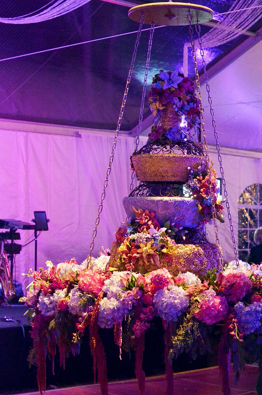 A cake was dropped from the ceiling of the tent at Orchid Ball, as part of a celebration for the 40th anniversary.