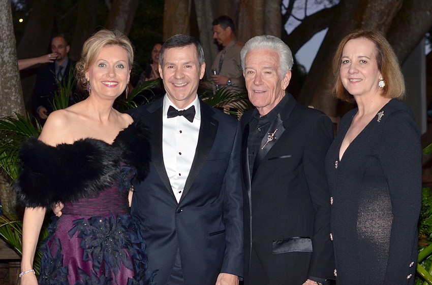 Rosemary Reinhardt and David Welle with Doug and Ann Logan