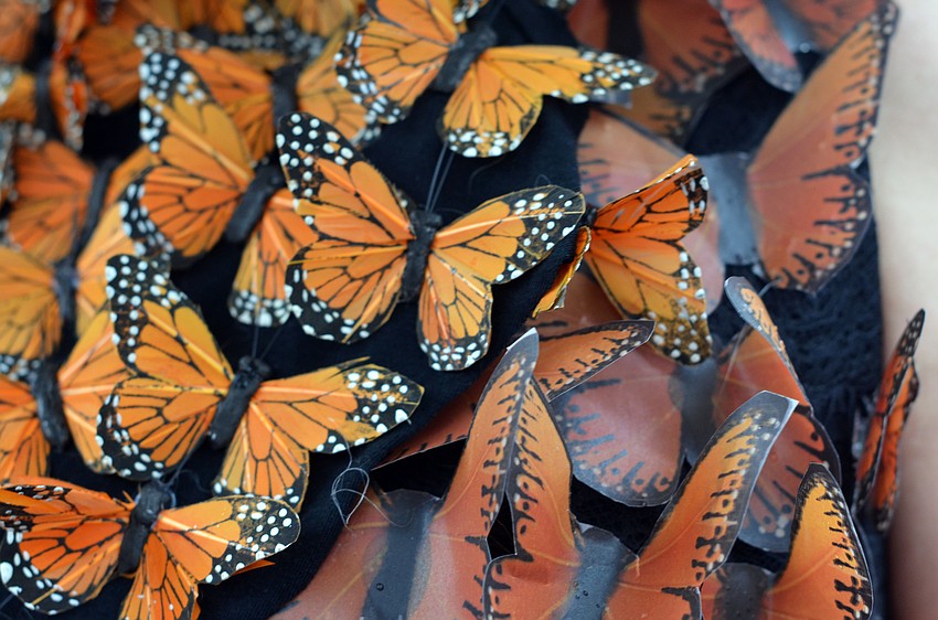 Miqui Lora's Effie Trinket from 'The Hunger Games' costume was handmade with butterflies.