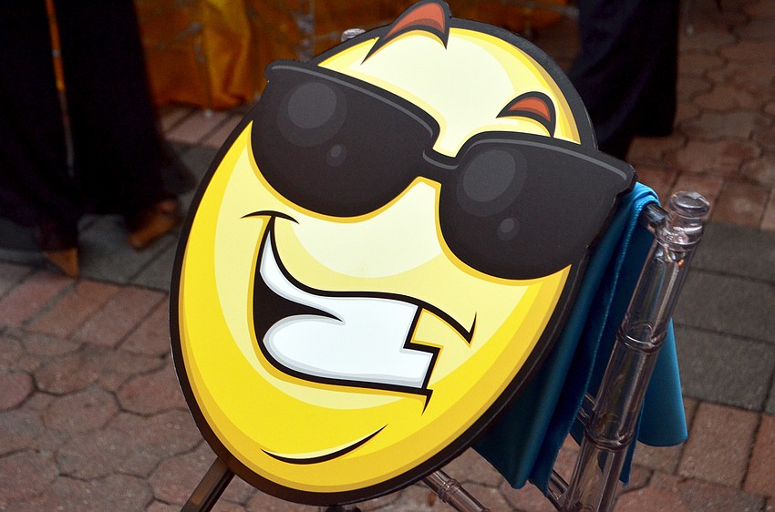 The smiley sunglasses emoji