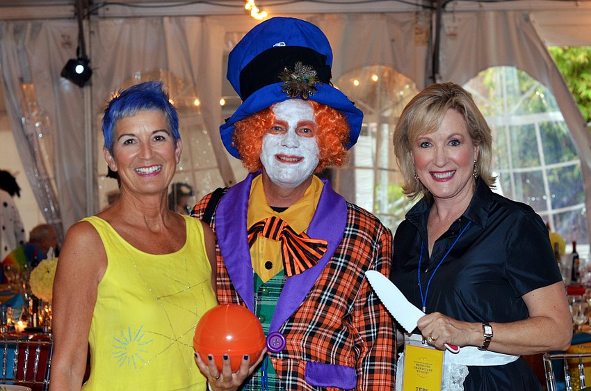 Colleen Tobin as Joy from Inside Out, David Sessions as the Mad Hatter and Teri Hansen