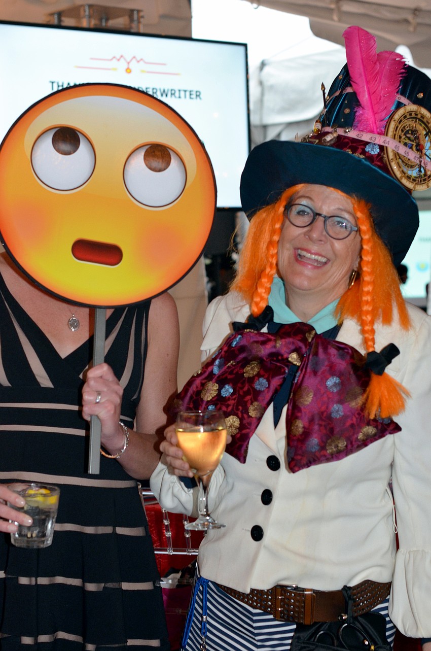 Kim Westad as the rolling eye emoji and Jennifer Mumford as 'Mad'