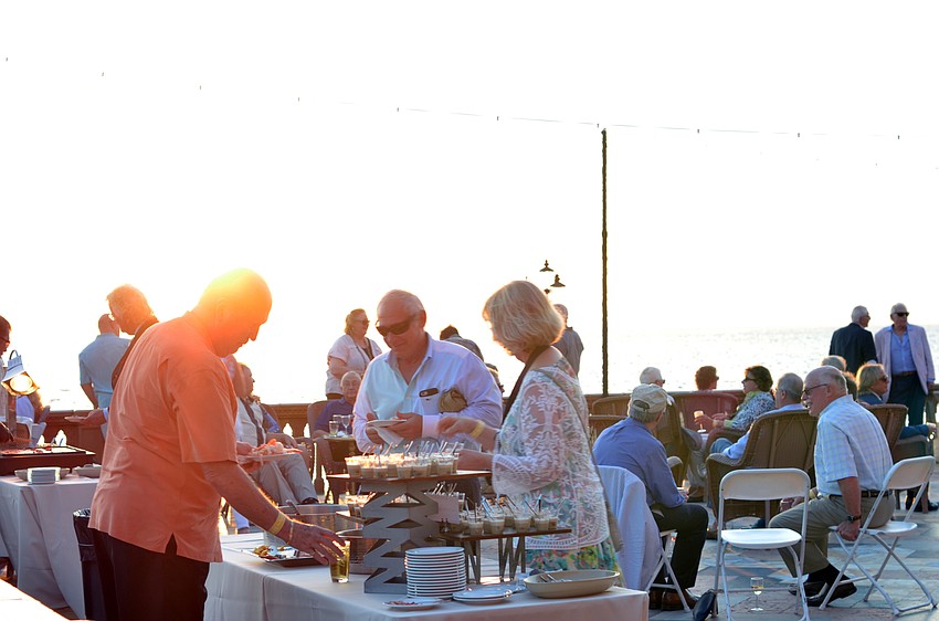 VIP guests enjoyed food and an open bar on the bayfront terrace during  Wine Walk to Ca’ d’Zan.