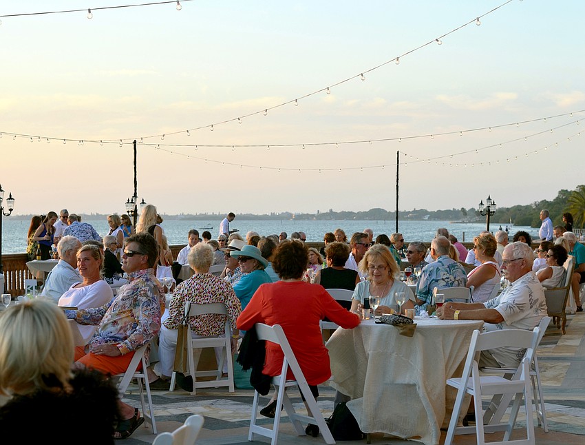 VIP guests enjoyed food and an open bar on the bayfront terrace during  Wine Walk to Ca’ d’Zan.