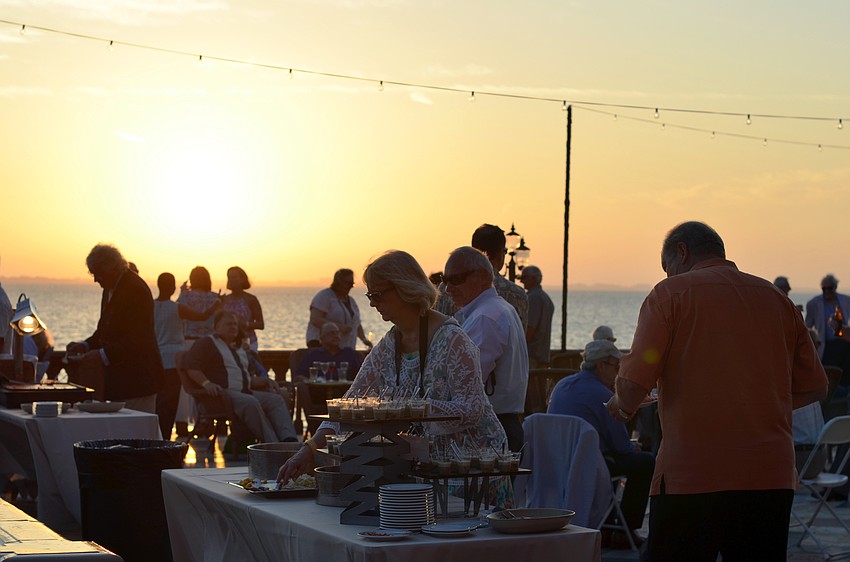 VIP guests enjoyed food and an open bar on the bayfront terrace during  Wine Walk to Ca’ d’Zan.