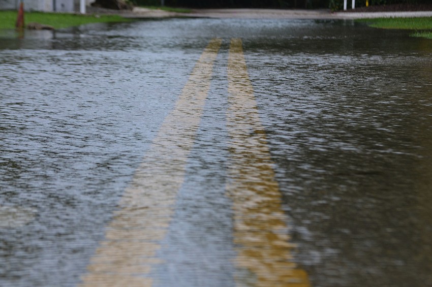Several side streets along Higel Avenue on Siesta Key  flooded today. The Sarasota County Sheriff Department is encouraging people to avoid standing water. “Vehicles can float in a foot or two of water,” Sheriff Department spokeswoman Kaitlyn Johnston.