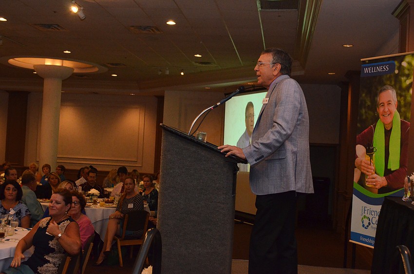 People Helping People Chairman Michael Juceam welcomes the crowd.