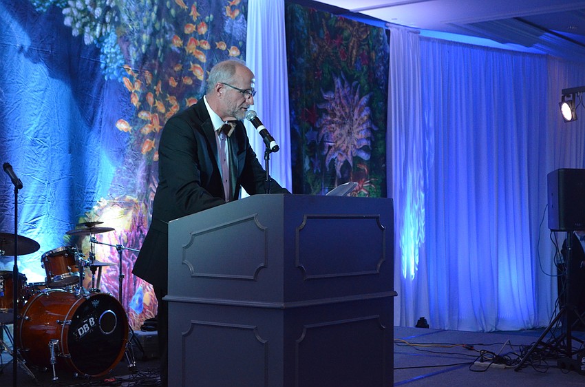 Chair of the Mote Board of Trustees Lowe Morrison welcomes the crowd.