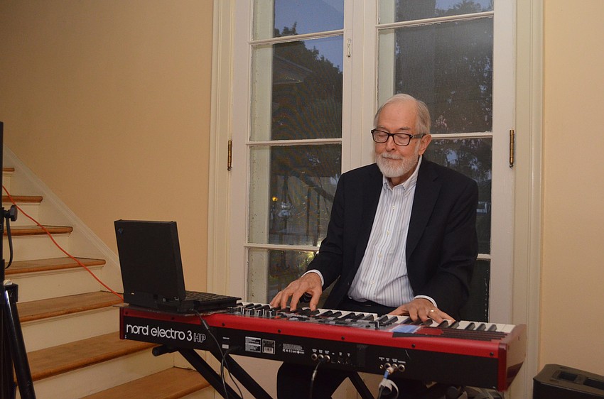 Michael Moran plays the keyboards for guests.