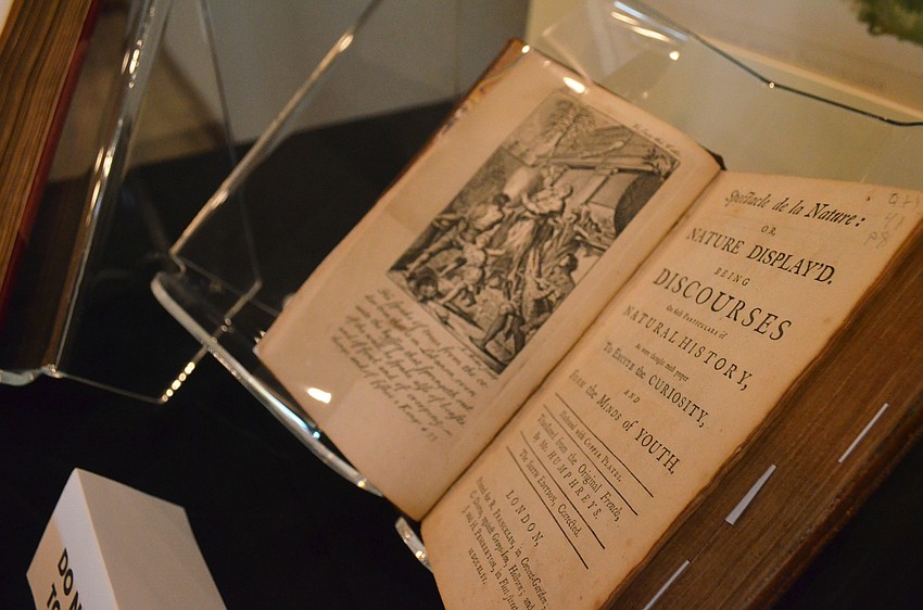 Victorian-era books on botany were on display for attendees to use as a visual accompanying the presentation.