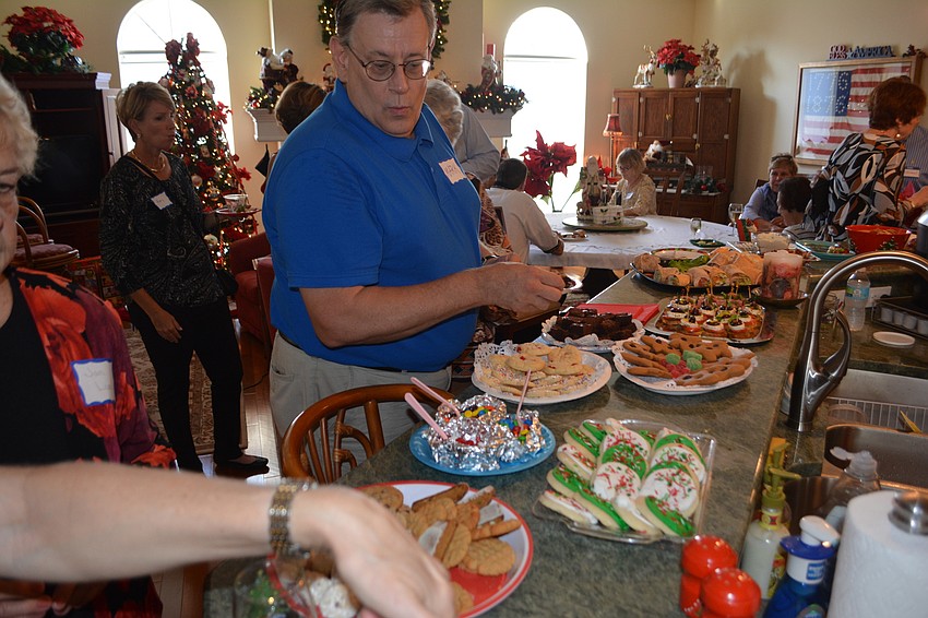 Mark Sellner enjoys the Holly Jolly spread.