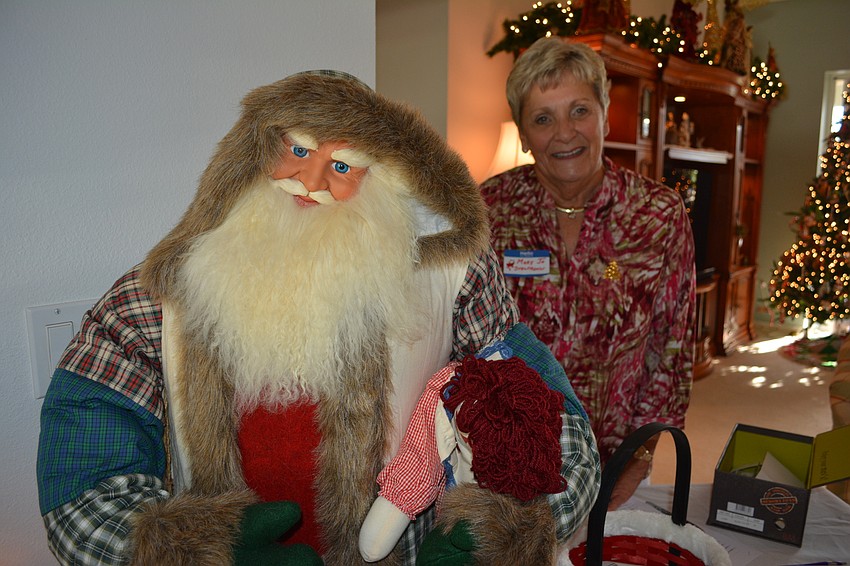 Even as the Holly Jolly attendees left, Mary Jo Steltmann had company.
