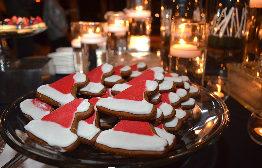 Guests enjoyed delectable desserts such as holiday cookies, chocolate-covered pretzels and macarons.