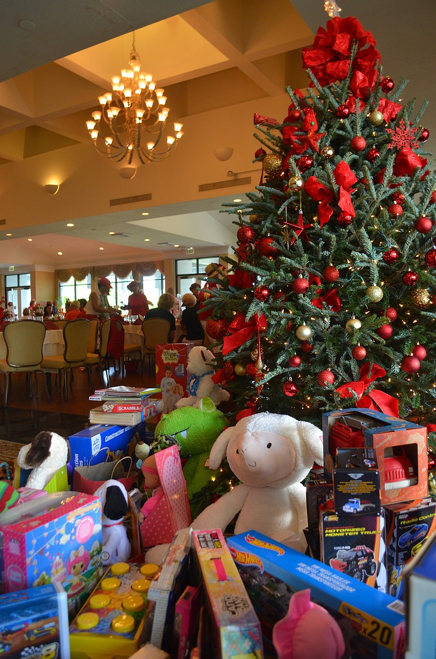 Each attendee brought a gift to donate to Toys for Tots.