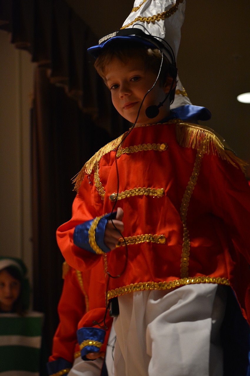 Aiden  Hill, a general, leads the soldiers through Candy Cane Lane.