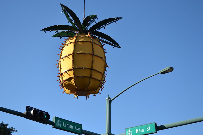 Sarah, Avery and Jake Portugal check out the rides on First Street.
