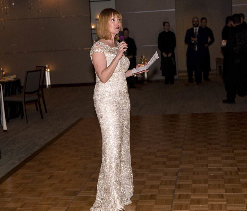 Event host Emily Walsh addresses the crowd.