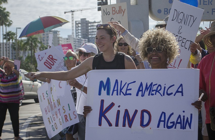 Demonstrators line the street along Bayfront Drive.