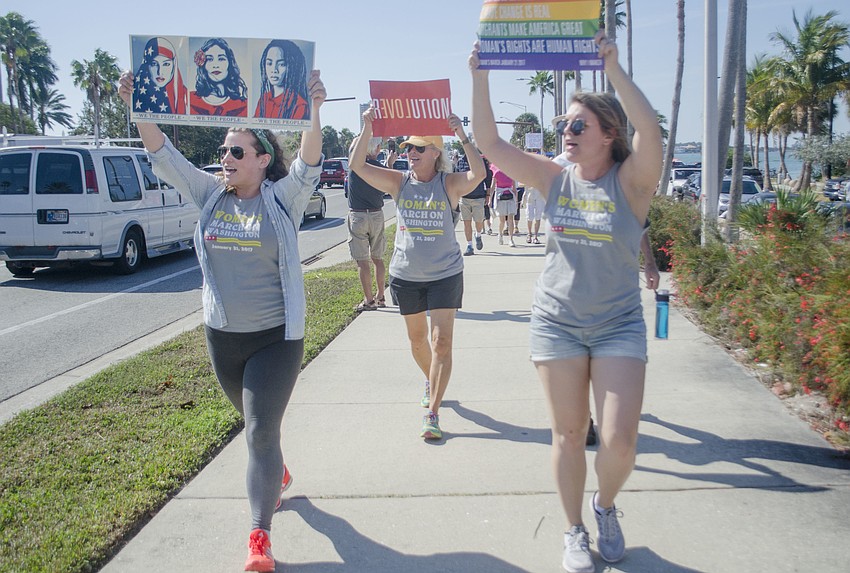 Elizabeth Searcy, Nancy Cooperrider and Hannah Lyons make their way back over the Ringling Bridge.